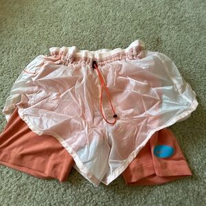Nike Women's Athletic Shorts in Pink and Orange